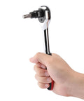 Hand holding ratchet with Torx Bit And Socket Set 25 Piece With 13 Star Bits T8 To T60 And 12 E Torx Sockets E4 To E22 Hardcore CRV Steel