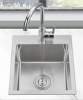Top view of 15 Inch Bar Sink Drop In Topmount With Single Bowl 304 Stainless Steel Handmade Kitchen Bar Sink Built For Prep And Entertaining Includes Basket Strainer Bar Grade Tough And Rust Resistant Durable installed in countertop