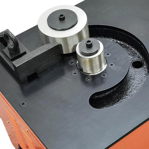Close-up of Badass Heavy Duty Electric Rebar Bender With 1-1/4 Inch Max Diameter Steel Bending Table Machine 110V 3000W controls and rollers.
