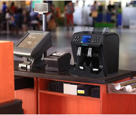 Heavy Lifter Bill Counter Machine That Handles Mixed Denomination Sorting With Multi Currency Support Fast Cash Stacking And Legit Checker Tech Built In Printer Port Ready on retail counter.
