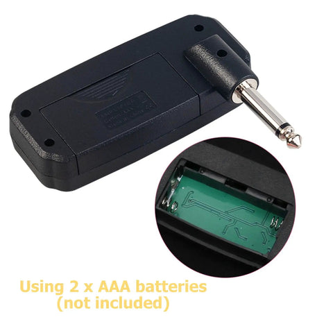 Portable Guitar Headphone Amp For Quiet Practice JA-01 battery compartment and plug view, compact desktop device.