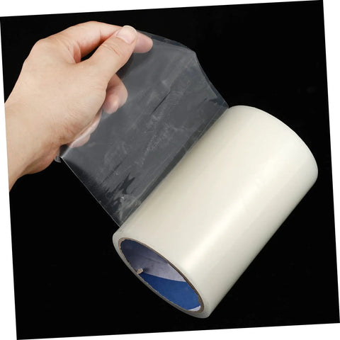 Two Rolls Tent Repair Tape UV Protected Seaming Tape Greenhouse Quick Fix Solution DIY Friendly Canopy Repair Tape Irregular Surfaces Self Priming Sealant Long Lasting Durable Repair Tape being unrolled by a hand on a black background.