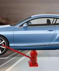Heavy Duty 30 Ton Hydraulic Bottle Jack For Cars And Pickup Trucks 66000 Pound Alloy Steel in use lifting a blue car.