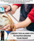 Person using Pro Grade Heavy Duty Vinyl Apron Big Ol Extra Large 43 By 29 Inch Chest To Knee Coverage Waterproof Oil Resistant Great For Dishwashing Butchering Dog Grooming Fish Cleaning And More during dog grooming