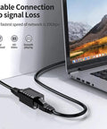 RJ45 Female To Female Ethernet Coupler In Line Patch Cord Extender Supports Cat7 Cat6 Cat5e Cat5 Networks Black 2 Pack connected to laptop