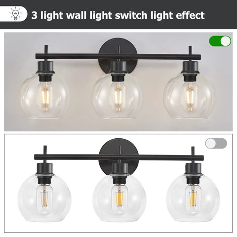 Super Stylish Modern Black Three Light Vanity Lights With Clear Glass Globe Shades Rust Resistant Matte Finish Bathroom Wall Sconce Over Mirror For Bedroom Living Room Hallway with switch light effect shown.