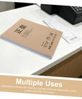 Two Part Carbonless Paper Writing Pads For Handwritten Notes And Duplicate Copies, A4 Size White And Yellow Office Paper, Portable 50 Set Note Pads For Quick Orders, Invoices, And Payments In Office Or Retail. A4 carbonless duplicate pad on office desk with receipt