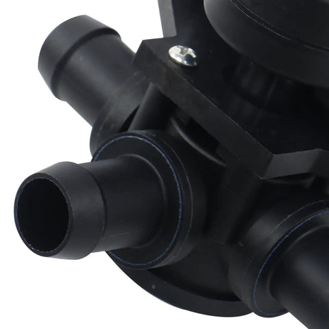 Hella Solid Tesla Model X Three Way Heater Control Valve Replacement close-up showing black plastic construction and coolant inlets.