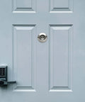 Solid Brass Door Peephole Viewer With 220 Degree HD Lens, Heavy Duty Privacy Cover installed on a door, Satin Nickel Finish