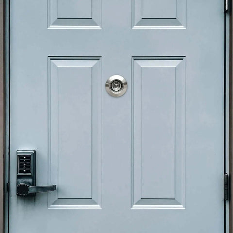 Solid Brass Door Peephole Viewer With 220 Degree HD Lens, Heavy Duty Privacy Cover installed on a door, Satin Nickel Finish