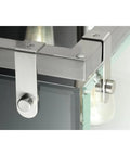 Close-up of Brushed Nickel frame with glass on Glayse Collection 3-Light Clear Glass Luxe Bath Vanity Light, sleek modern fixture detail