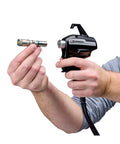 Person holding spray tip for Badass Cordless Airless Paint Sprayer With Instant Electric Trigger for home projects.