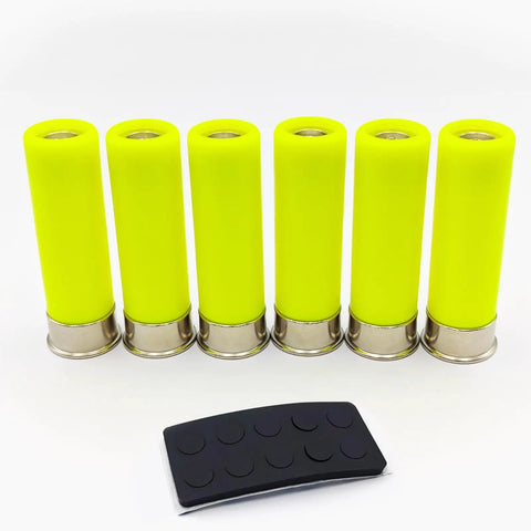 Six yellow 20 Gauge Safety Practice Rounds Action Trainer Dummy Snap Caps Dry Fire Training Kit 6 Pack with black base pad.