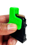 Close-up of Neon Green Magazine Speed Loader For CZ 457, 512, 452, 455, 453 And Savage Mark II in hand, side view.