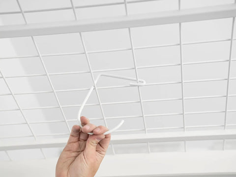 Installing Heavy Duty Overhead Storage Rack And Wall Mount Hooks Four Pack Steel Hooks for Bikes Ladders Tools And Gear on grid rack