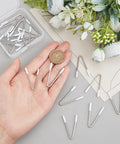 Hand holding 20 Piece V Shape Bra Wires Stainless Steel Underwire Replacement For Bras Corsets Dresses And Swimwear Durable Steel Wires