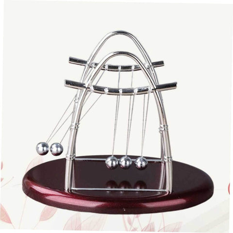 Large Newton Cradle Pendulum Desktop Physics Toy For Home Office Use Five Ball Demonstration on wooden base.