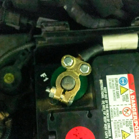 Premium Brass Battery Terminal Connectors Engineered For Marine Car Boat And Rv Applications installed on a battery.