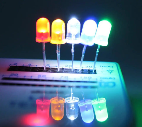 Array of lit LEDs in five colors on breadboard, 450 Piece 5mm LED Diode Kit With Five Colors White Red Yellow Green Blue For DIY Electronics Projects And Lighting Experiments Assorted Mini Round Top Light Emitting Diodes