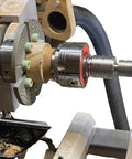 Beefed Up Live Tailstock Chuck Adapter For Wood Lathe Converts Dead Tailstock To Live With 1 Inch By 8 Tpi Thread Mount And Number Two Morse Taper Mount installed on a lathe.