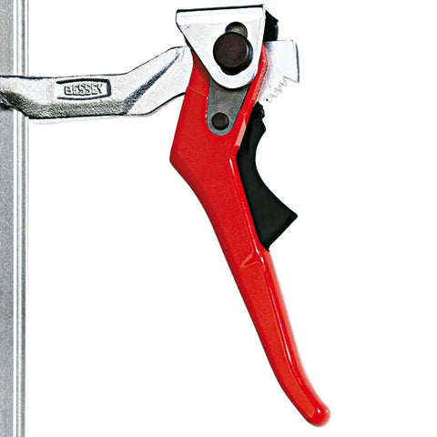 Heavy Duty 20 Inch Lever Clamp With Quick Grab Ratchet Jaw Dead Nuts cold drawn steel frame close-up of red lever mechanism