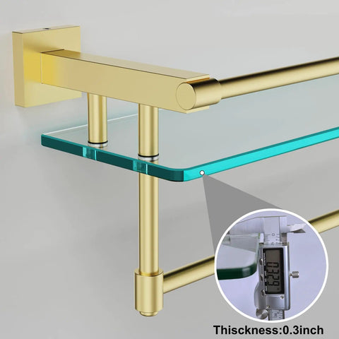 Close-up of Pro Grade 20 Inch Wall Mount Glass Shelf With Towel Rack In Brushed Gold Finish showing tempered glass thickness.