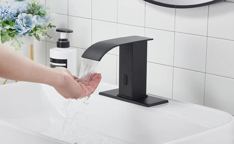 Automatic Sensor Matte Black Touchless Bathroom Sink Faucet With Drain Assembly in use, water flowing onto hands