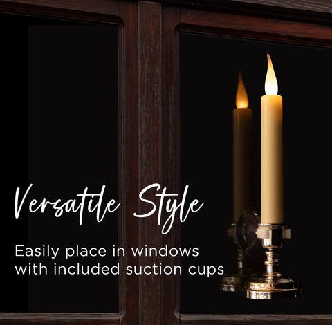 Flameless Ivory Window Candles Kit With 10 Candles And Removable Gold Weighted Plastic Holders, shown on window with reflection