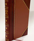 Side view of leather-bound book Lathe Work for Beginners; brown cover with gold-foil spine accents and red bookmark.