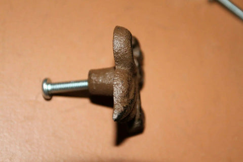 Side view of French Victorian Cabinet Knobs Pack Of 60 Cast Iron Fleur De Lis Hardware for 2-Inch Cabinets showing screw attachment.