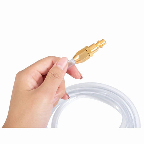 Hand holding Solid Brass Pneumatic Fittings 2 Pack with Quarter Inch Barb and NPT Ends attached to polyurethane air hose.