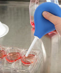 220ML Rubber Squeeze Bulb For Liquid Handling showing pipette application with blue bulb on lab tray
