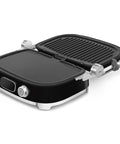 SMEG MGF01 Retro Countertop Electric Grill and Panini Press With Swappable Plates For Waffles, Burgers, And Steak, open view in black finish