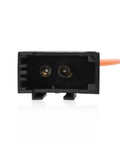 Front view of black plastic fiber optic bypass loop adapter with two circular ports and orange cable