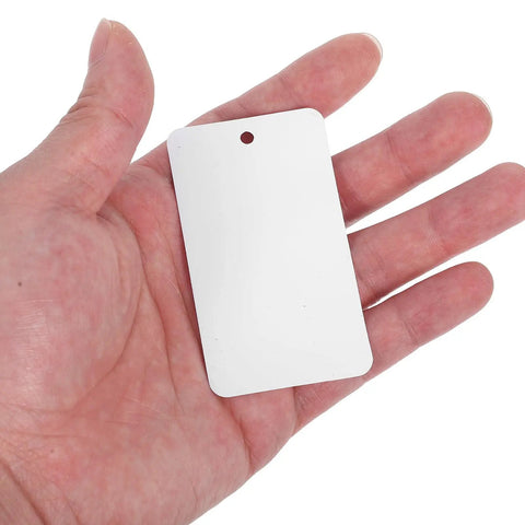 Blank White PVC Hanging Tags With Lanyard Waterproof 100 Pcs Jewelry Display Labels held in hand