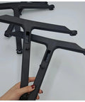 Hand holding two black spray lances from the Spray Lance Assembly Kit For Agricultural Drones Front Right And Rear Left Lances Included Pro Grade Two Piece Compatible With T30 Series Drones Precision Field Spraying Accessories For Efficient Crop Coverage.