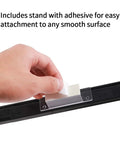 Close-up of USB Wired Infrared Sensor Bar for Nintendo Wii and Wii U Replacement with clear stand and adhesive being applied