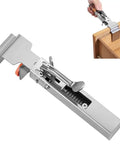 Heavy Duty Adjustable Drawer Clamp With One Touch Quick Release For No Sweat Cabinet Front Install and Hassle Free Drawer Panel Alignment Jig and Secure Holders, stainless steel material, shown in use.