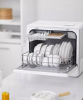 Flat Out Reliable Compact Countertop Dishwasher With Fully Automatic Smart Drying And Triple Wash Filter For Tiny Kitchens Or Rv Campers No Sweat Setup Easy Glide Rack Holds massive dinner plates, shown loaded with dishes.