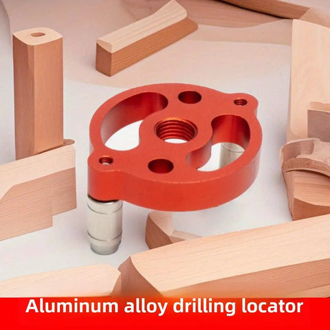 Boss Grade Self Centering Doweling Jig Kit With Knockout Wood Drill Guide showing a red aluminum drilling locator on wooden pieces.