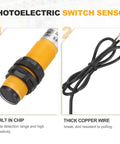 E3F-DS10P2 Photoelectric Sensor and wiring with built-in chip and thick copper wire for industrial automation.