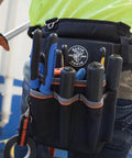 Tradesman Pro Tool Pouch With Tape Thong And Heavy Duty Reinforced Bottoms, Six Pocket Electrician Bag in use on waistband.