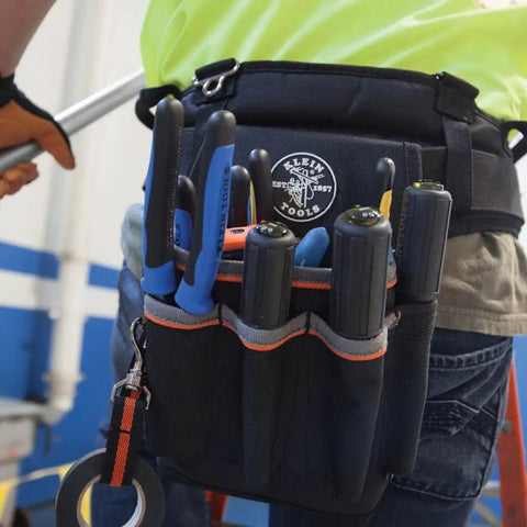 Tradesman Pro Tool Pouch With Tape Thong And Heavy Duty Reinforced Bottoms, Six Pocket Electrician Bag in use on waistband.
