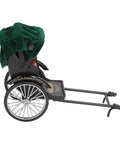 Vintage Red Zinc Alloy Rickshaw Model Toy With Sick Hand Painted Details And A Clean Finish visible from the side with green fabric.