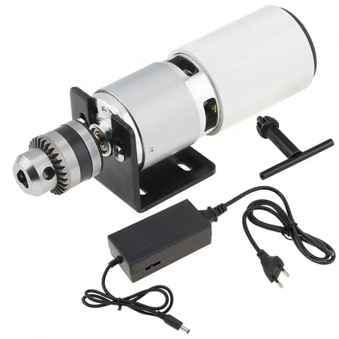 Top Shelf Knockout 775 DC Motor Table Drill Featuring B10 Chuck and Slick Variable Speed Switch with power adapter and setup tools.