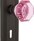 Old School Waldorf Pink Crystal Door Knob Set With Oil Rubbed Bronze Deco Plate For Passage Non Locking Hardware Two And Three Quarters Inch Backset Solid Forged Brass Complete One Door Restoration Kit on white background.