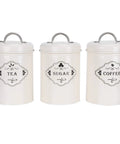 Boost Your Pantry Game With This Three Piece Airtight Kitchen Storage Jar Set Crafted From Thick Powder Coated Iron, jars labeled for tea, sugar, coffee.