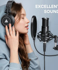 Person using XLR Condenser Microphone With Cardioid Pattern, Boom Arm And Pop Filter For Streaming And Podcasting setup.