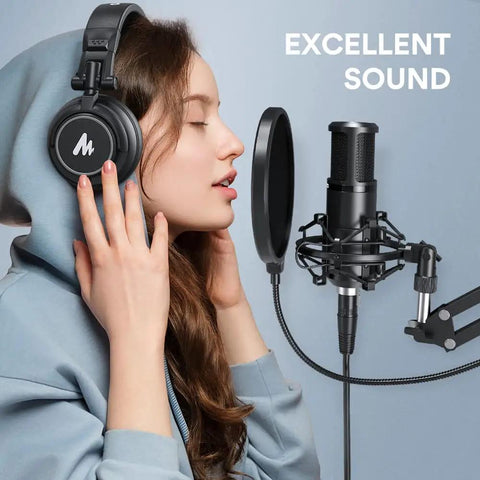 Person using XLR Condenser Microphone With Cardioid Pattern, Boom Arm And Pop Filter For Streaming And Podcasting setup.