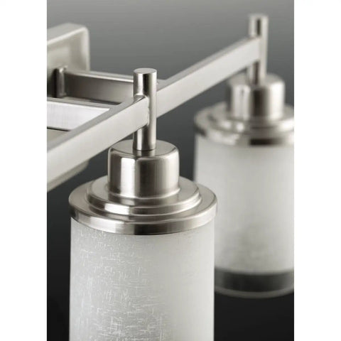 Close-up of Alexa Collection 3 Light Bath Vanity Light With Etched Linen Glass and Clear Edge Glass in Brushed Nickel Finish